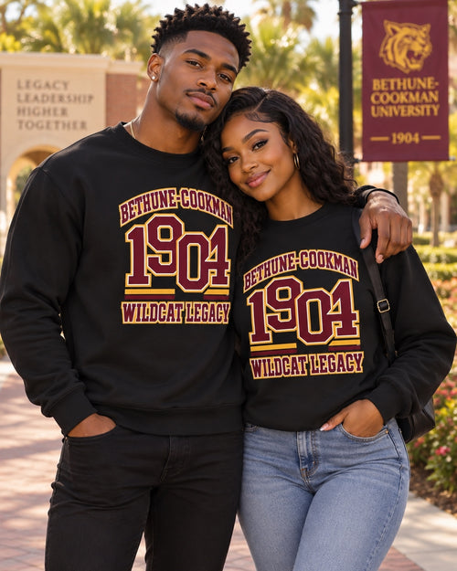 Bethune-Cookman University couple wearing 1904 Wildcat Legacy crewneck sweatshirts